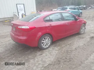 2016 Kia Forte LX with VIN KNAFX4A64G5580203, listed as a IAAI auction lot 41961563 with 140,800 mi miles. Bid and sale history available at carsss.com. Image 4.