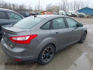 2012 Ford Focus SE with VIN 1FAHP3F21CL415006, listed as a IAAI auction lot 42073643 with 168,516 mi miles. Bid and sale history available at carsss.com. Image 4.