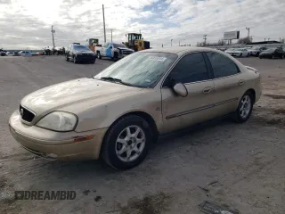 2000 Mercury Sable LS Premium with VIN 1MEFM55S0YA621927, listed as a Copart auction lot 87052444 with 34,930 mi miles and Salvage Title. Bid and sale history available at carsss.com. Image 1.