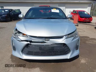 2014 Scion tC with VIN JTKJF5C70E3068144, listed as a IAAI auction lot 41983751 with 137,894 mi miles. Bid and sale history available at carsss.com. Image 12.