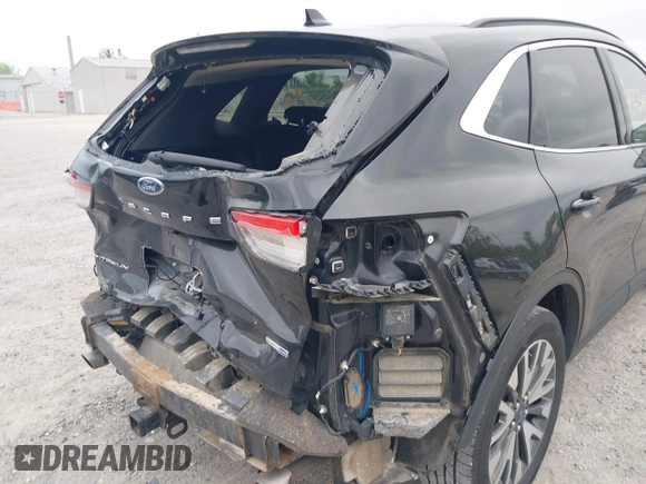 2020 Ford Escape Titanium with VIN 1FMCU9J97LUA35212, listed as a IAAI auction lot 42347274 with 50,419 mi miles and . Bid and sale history available at DreamBid. Image 6.