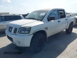 2004 Nissan Titan LE with VIN 1N6AA07A34N570788, listed as a IAAI auction lot 41823592 with 228,344 mi miles and . Bid and sale history available at DreamBid. Image 2.