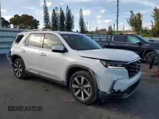 2024 Honda Pilot Touring с VIN 5FNYG2H76RB008887, выставлен на аукционе Copart как лот 46479745 с пробегом 12 947 миль миль и Списание • Salvage title. История ставок и продаж доступна на DreamBid. Изображение 4.
