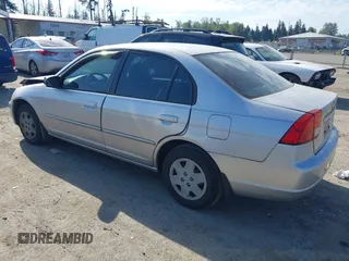 2003 Honda Civic LX with VIN JHMES16503S000239, listed as a IAAI auction lot 42184911 with 148,257 mi miles and . Bid and sale history available at DreamBid. Image 3.