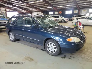 2000 Hyundai Elantra z VIN KMHJW35F5YU181324, wystawiony jako Copart lot #48016775 z przebiegiem 79 686 mil mil oraz Czysty tytuł • Clean title. Historia ofert i sprzedaży dostępna na DreamBid. Obrazek 4.