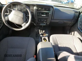 2001 Jeep Cherokee Sport with VIN 1J4FF58S71L540211, listed as a Copart auction lot 87089444 with 190,711 mi miles and Clean title. Bid and sale history available at DreamBid. Image 8.