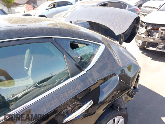 2015 Nissan Sentra SR with VIN 3N1AB7AP0FL692116, listed as a IAAI auction lot 42074635 with Not Provided miles and . Bid and sale history available at DreamBid. Image 13.