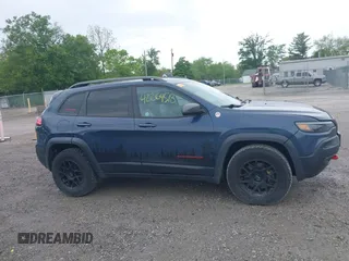2019 Jeep Cherokee Trailhawk z VIN 1C4PJMBX1KD364100, wystawiony jako IAAI lot #42264518 z przebiegiem 117 020 mil mil oraz . Historia ofert i sprzedaży dostępna na DreamBid. Obrazek 13.