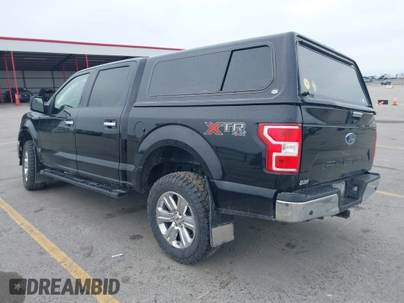 2018 Ford F-150 XL with VIN 1FTEW1E5XJKC37082, listed as a IAAI auction lot 42335721 with 167,401 mi miles and . Bid and sale history available at DreamBid. Image 3.