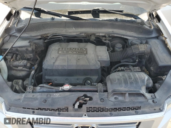 2006 Honda Ridgeline RTS z VIN 2HJYK16436H550371, wystawiony jako Copart lot #59504235 z przebiegiem 275 187 mil mil oraz Szkoda całkowita • Salvage title. Historia ofert i sprzedaży dostępna na DreamBid. Obrazek 11.