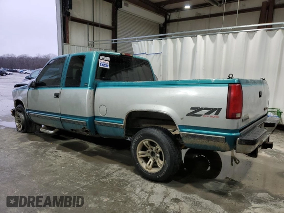 1995 GMC Sierra 1500 z VIN 2GTEK19K5S1509969, wystawiony jako Copart lot #42945545 z przebiegiem 361 334 mil mil oraz Szkody całkowita. Historia ofert i sprzedaży dostępna na DreamBid. Obrazek 2.