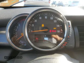 2016 MINI Hardtop 4 Door с VIN WMWXU1C51G2E16685, выставлен на аукционе Copart как лот 63425225 с пробегом 117 597 миль миль и Списание • Salvage title. История ставок и продаж доступна на DreamBid. Изображение 9.