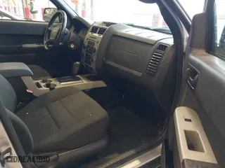 2010 Ford Escape XLT with VIN 1FMCU0D70AKB09942, listed as a IAAI auction lot 41572582 with 218,296 mi miles. Bid and sale history available at carsss.com. Image 5.