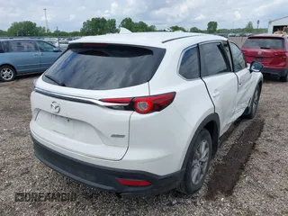 2016 Mazda CX-9 Sport with VIN JM3TCABY4G0100620, listed as a IAAI auction lot 42316216 with 191,245 mi miles and . Bid and sale history available at DreamBid. Image 4.