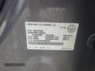 2018 Honda Pilot Touring z VIN 5FNYF6H93JB500695, wystawiony jako Copart lot #83302284 z przebiegiem 12 086 mil mil oraz Szkoda całkowita • Salvage title. Historia ofert i sprzedaży dostępna na DreamBid. Obrazek 13.