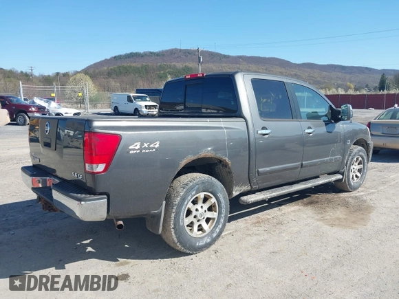 2004 Nissan Titan LE with VIN 1N6AA07B24N574789, listed as a IAAI auction lot 42039183 with 147,691 mi miles. Bid and sale history available at carsss.com. Image 4.