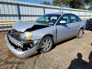2005 Ford Five Hundred SE with VIN 1FAFP23135G150856, listed as a Copart auction lot 80564344 with 150,793 mi miles and Salvage Title. Bid and sale history available at carsss.com. Image 1.