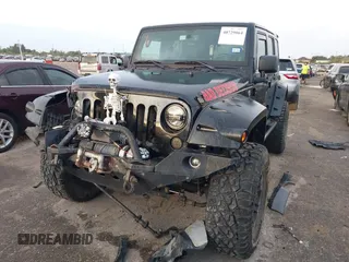 2013 Jeep Wrangler Unlimited Rubicon with VIN 1C4BJWFG2DL531203, listed as a IAAI auction lot 40729064 with 84,296 mi miles. Bid and sale history available at carsss.com. Image 17.