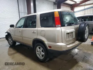 2001 Honda CR-V SE z VIN JHLRD18721S000738, wystawiony jako Copart lot #56387385 z przebiegiem 214 711 mil mil oraz Szkoda całkowita • Salvage title. Historia ofert i sprzedaży dostępna na DreamBid. Obrazek 2.