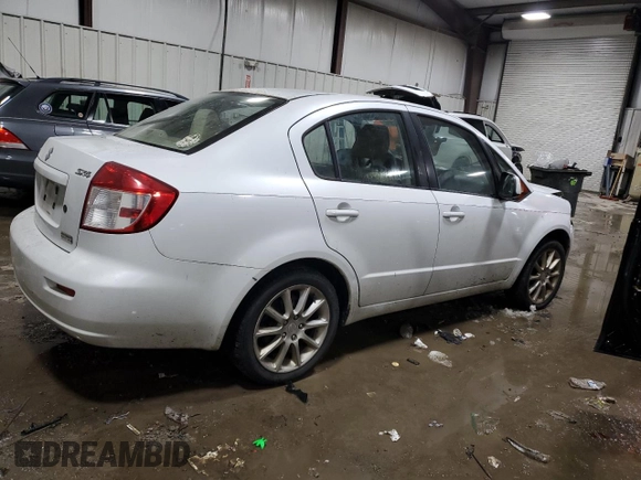 2011 Suzuki SX4 LE z VIN JS2YC5A29B6302397, wystawiony jako Copart lot #82691304 z przebiegiem 251 382 mil mil oraz Szkoda całkowita • Salvage title. Historia ofert i sprzedaży dostępna na DreamBid. Obrazek 3.