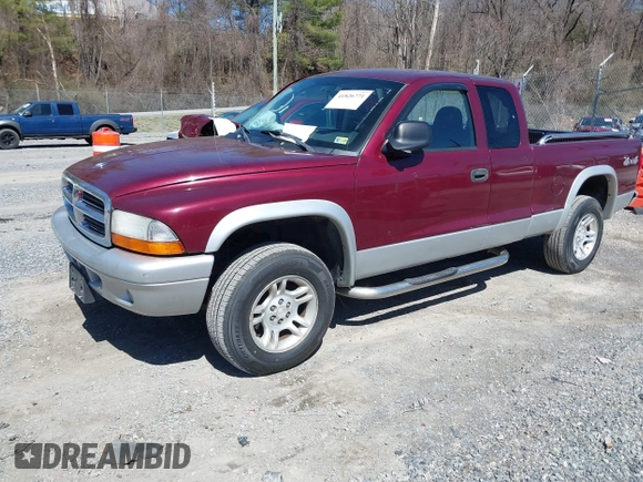 2003 Dodge Dakota SLT with VIN 1D7HG42N33S369870, listed as a IAAI auction lot 41826771 with 214,840 mi miles. Bid and sale history available at carsss.com. Image 2.