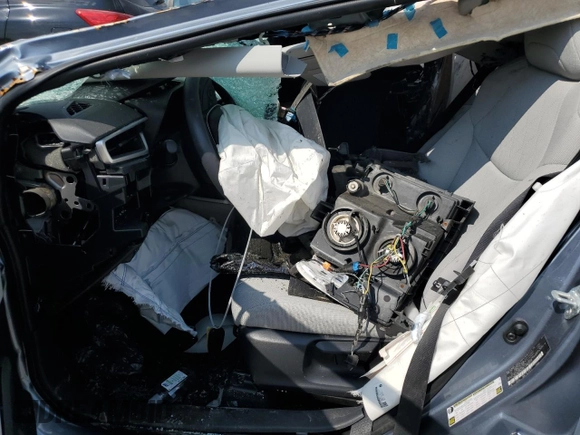 2023 Toyota Corolla Cross LE with VIN 7MUCAABG8PV066528, listed as a Copart auction lot 58902095 with 14,190 mi miles and Salvage title. Bid and sale history available at DreamBid. Image 7.