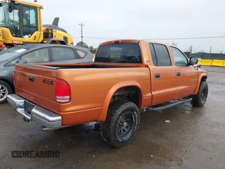 2000 Dodge Dakota Sport with VIN 1B7GG2AN7YS645552, listed as a IAAI auction lot 41811635 with 194,498 mi miles and . Bid and sale history available at carsss.com. Image 4.