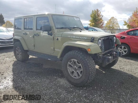 2013 Jeep Wrangler Unlimited Rubicon 10th Anniversary with VIN 1C4HJWFG4DL549065, listed as a Copart auction lot 75899594 with 127,960 mi miles and Salvage title. Bid and sale history available at DreamBid. Image 4.