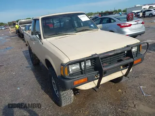 1984 Datsun 720 z VIN JN6ND06Y4EW011429, wystawiony jako IAAI lot #42358221 z przebiegiem 148 916 mil mil oraz . Historia ofert i sprzedaży dostępna na DreamBid. Obrazek 1.