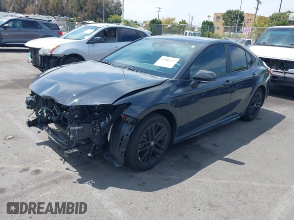 2025 Toyota Camry LE with VIN 4T1DAACK8SU546764, listed as a IAAI auction lot 41981231 with 2,338 mi miles and . Bid and sale history available at DreamBid. Image 2.