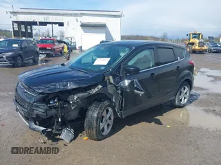 2014 Ford Escape SE with VIN 1FMCU9GX2EUD41176, listed as a IAAI auction lot 42028822 with 101,595 mi miles and . Bid and sale history available at DreamBid. Image 2.