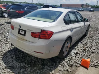 2014 BMW 3 Series 320i xDrive with VIN WBA3C3C51EF983592, listed as a Copart auction lot 60608765 with 195,061 mi miles and Salvage title. Bid and sale history available at DreamBid. Image 3.