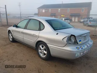 2004 Ford Taurus SES z VIN 1FAHP55S34G131304, wystawiony jako IAAI lot #41130286 z przebiegiem 112 404 mil mil oraz . Historia ofert i sprzedaży dostępna na DreamBid. Obrazek 3.