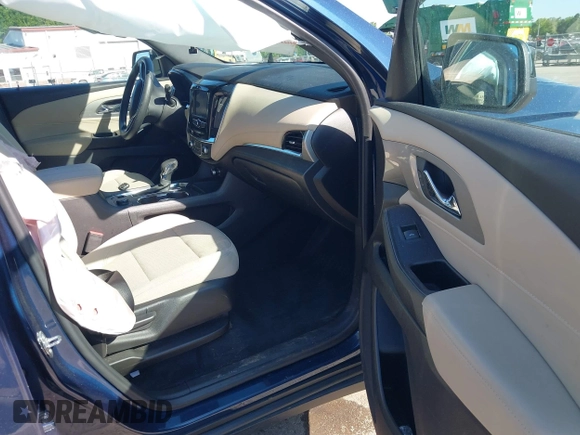 2022 Chevrolet Traverse LS with VIN 1GNERFKW3NJ120416, listed as a IAAI auction lot 42131632 with 51,988 mi miles and . Bid and sale history available at DreamBid. Image 5.