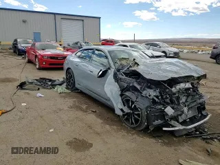 2022 BMW 4 Series M440i xDrive with VIN WBA13AW0XNFM27700, listed as a Copart auction lot 48406425 with Not provided miles and Salvage title. Bid and sale history available at DreamBid. Image 14.
