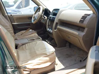 2002 Honda CR-V LX z VIN JHLRD68402C010389, wystawiony jako IAAI lot #42425846 z przebiegiem 129 308 mil mil oraz . Historia ofert i sprzedaży dostępna na DreamBid. Obrazek 5.
