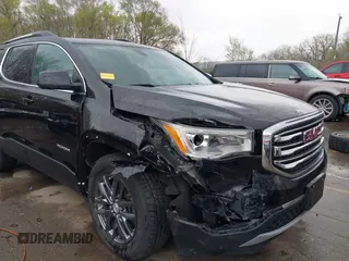 2018 GMC Acadia SLT with VIN 1GKKNULS5JZ113894, listed as a IAAI auction lot 41929343 with 85,825 mi miles and . Bid and sale history available at carsss.com. Image 6.