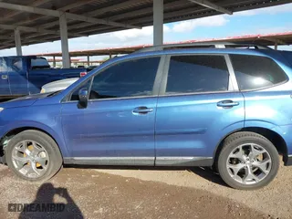 2015 Subaru Forester 2.5i Touring with VIN JF2SJAWC0FH485216, listed as a IAAI auction lot 41744706 with 61,683 mi miles. Bid and sale history available at carsss.com. Image 14.