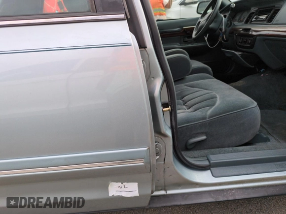 1996 Mercury Grand Marquis GS with VIN 2MELM74W5TX653873, listed as a Copart auction lot 74659254 with 86,589 mi miles and Salvage Title. Bid and sale history available at DreamBid. Image 12.