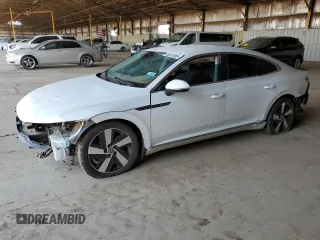 2021 Volkswagen Arteon SE z VIN WVWAR7AN3ME012195, wystawiony jako Copart lot #60237885 z przebiegiem 49 396 mil mil oraz Czysty tytuł • Clean title. Historia ofert i sprzedaży dostępna na DreamBid. Obrazek 1.