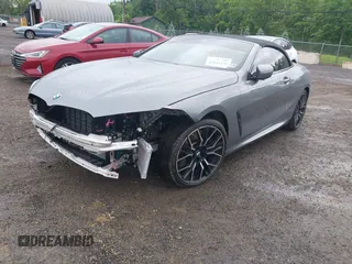2023 BMW 8 Series 840i with VIN WBADZ2C03PCM89675, listed as a IAAI auction lot 42301276 with 6,289 mi miles and . Bid and sale history available at DreamBid. Image 2.