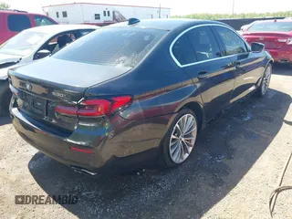 2021 BMW 5 Series 530i xDrive with VIN WBA13BJ0XMWX00677, listed as a IAAI auction lot 42100435 with 66,140 mi miles and . Bid and sale history available at DreamBid. Image 4.