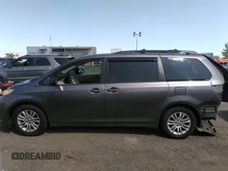 2014 Toyota Sienna XLE with VIN 5TDYK3DC2ES418860, listed as a IAAI auction lot 40139260 with 67,599 mi miles and . Bid and sale history available at DreamBid. Image 15.