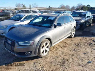 2014 Audi allroad Premium with VIN WA1TFAFL2EA068850, listed as a IAAI auction lot 41640053 with 168,660 mi miles. Bid and sale history available at carsss.com. Image 2.