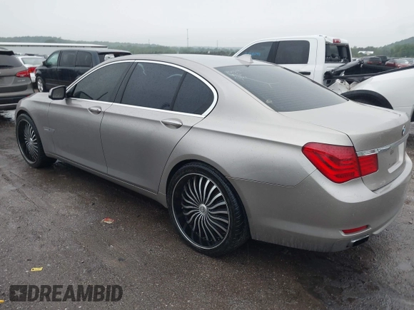 2012 BMW 7 Series 750i with VIN WBAKA8C50CDX01319, listed as a IAAI auction lot 42133359 with 168,986 mi miles and . Bid and sale history available at DreamBid. Image 3.
