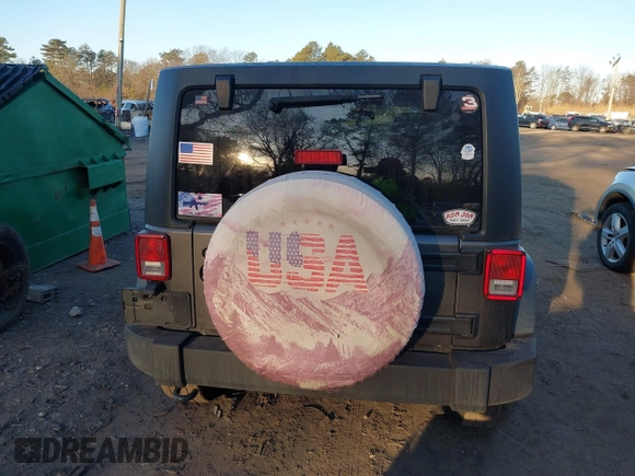 2018 Jeep Wrangler JK Unlimited Sport with VIN 1C4BJWDG2JL810424, listed as a IAAI auction lot 41610669 with 73,830 mi miles. Bid and sale history available at carsss.com. Image 16.