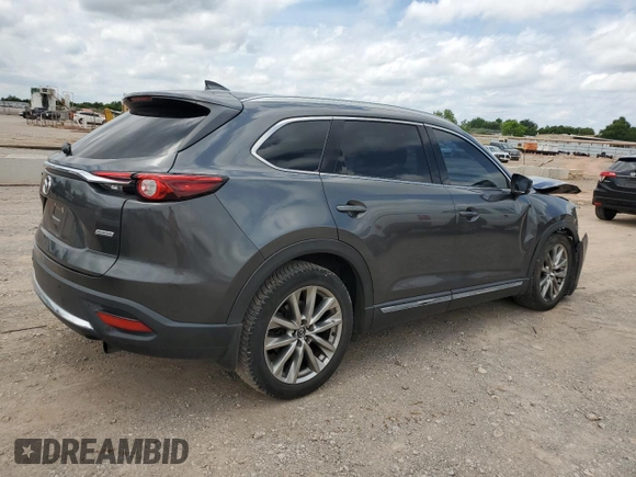 2016 Mazda CX-9 Grand Touring with VIN JM3TCADY3G0125814, listed as a Copart auction lot 58299595 with 127,035 mi miles and Salvage title. Bid and sale history available at DreamBid. Image 3.