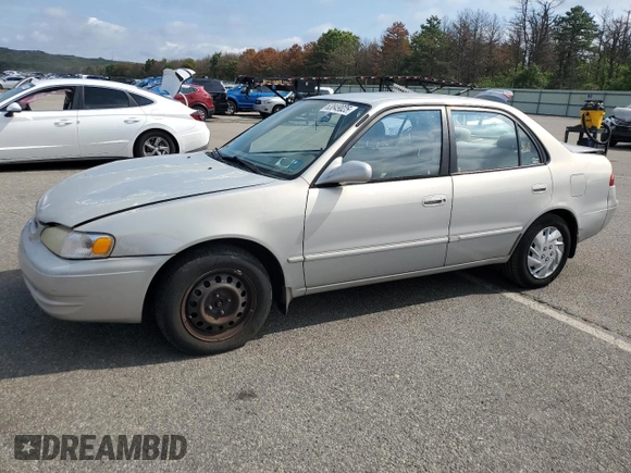 1999 Toyota Corolla VE with VIN 2T1BR12E7XC113103, listed as a Copart auction lot 63849025 with 104,830 mi miles and Salvage title. Bid and sale history available at DreamBid. Image 1.