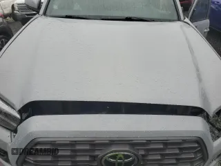 2021 Toyota Tacoma SR with VIN 3TMCZ5AN0MM395357, listed as a Copart auction lot 87086684 with 48,664 mi miles and Salvage title. Bid and sale history available at DreamBid. Image 11.