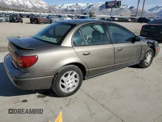 2000 Saturn SL with VIN 1G8ZK5276YZ227493, listed as a Copart auction lot 48172835 with 105,806 mi miles and Salvage title. Bid and sale history available at DreamBid. Image 3.